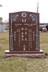Red granite upright monument
