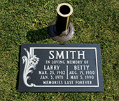 Granite marker and bronze vase